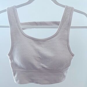 NEW never worn sports bra yoga top. Yogalicious. Size small
